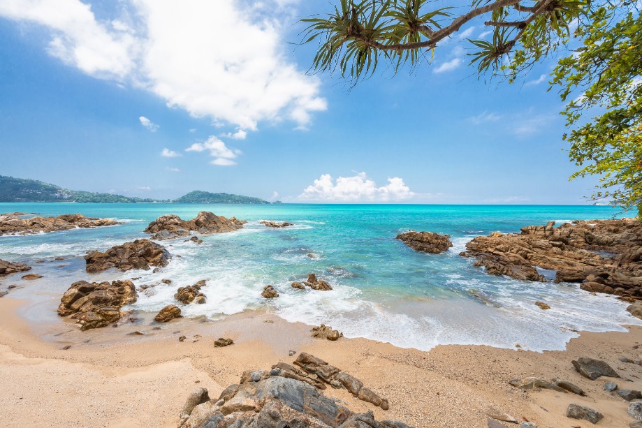 Surfing at Kalim Beach